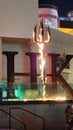 a fork torch with a fire burning in front of Gordon RamasyÃ¢â¬â¢s HellÃ¢â¬â¢s Kitchen restaurant in Las Vegas Nevada